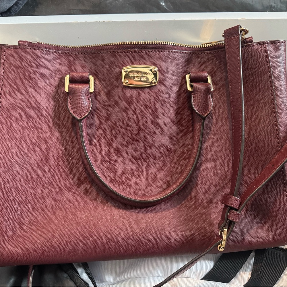 Used Maroon Michael Kors crossbody with handles